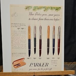 Parker Pen Collection Advertisement with Gold and Black Accents